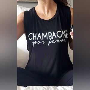 Add this fun graphic tank to your wardrobe! Soft slinky material with bold graph